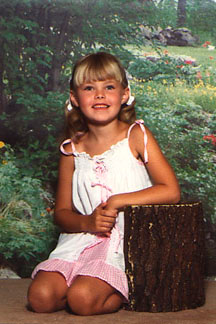 Illustration for article titled Goofy Glasses, Pretty Pigtails & Snaggletooth Smiles: September Is For School Portraits